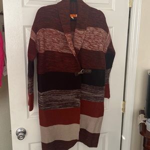 One A long brown/tan cardigan